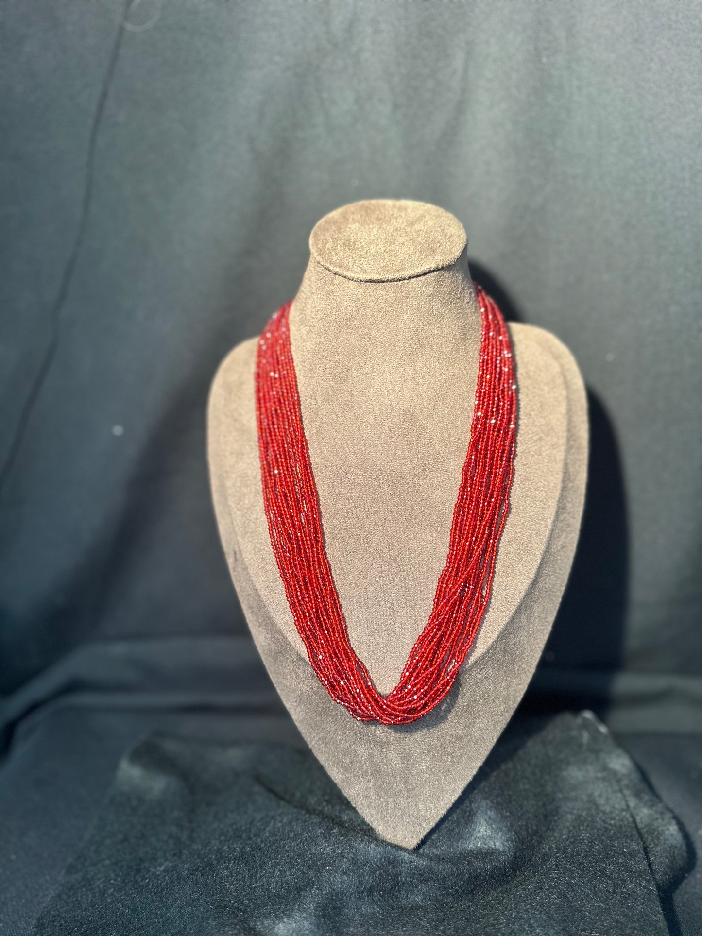 Multi-strand beaded necklace